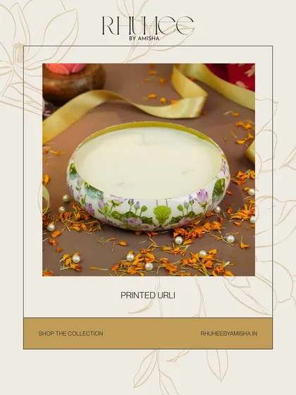 Add a festive glow with our Printed Urli Candle. The beautiful floral print on the metal urli makes it a lovely piece for Diwali decor, home styling, or gifting.