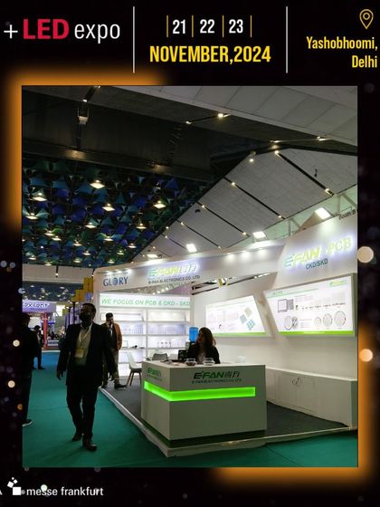 The Efanen booth, with its clean, modern aesthetic and green accent lighting, showcases advanced lighting components.