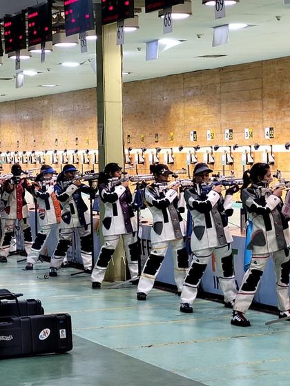 A line of women shooters at the Khelo India University Games 2022. The scale of national competitions like these is immense.