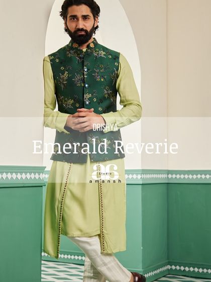 The emerald green bundi set, presented as a complete look. The combination of the floral embroidered jacket and draped kurta is a testament to our blend of tradition and elegance.