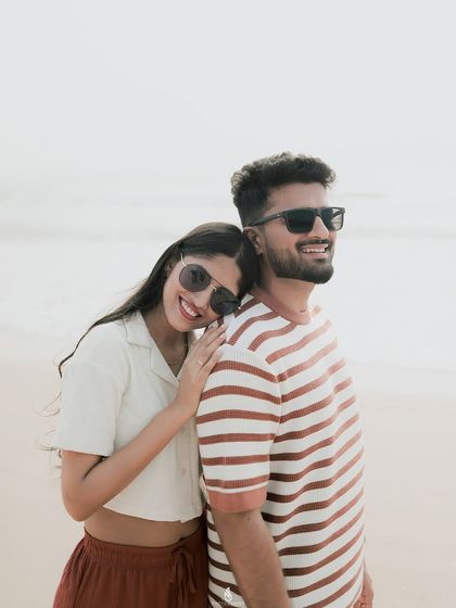 A sweet and candid moment of affection. My focus is on capturing the real love and friendship between partners during their engagement photoshoot.