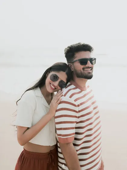 A sweet and candid moment of affection. My focus is on capturing the real love and friendship between partners during their engagement photoshoot.