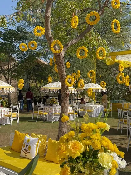 A classic Haldi ceremony, drenched in sunshine and happiness. We used traditional marigolds and custom block-printed umbrellas to create a joyful, open-air celebration in a beautiful garden setting.