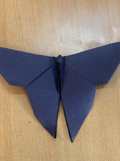 The symbol of our academy, a butterfly, carefully folded from paper. Our origami workshops are a camp favorite, blending art with mindful concentration.