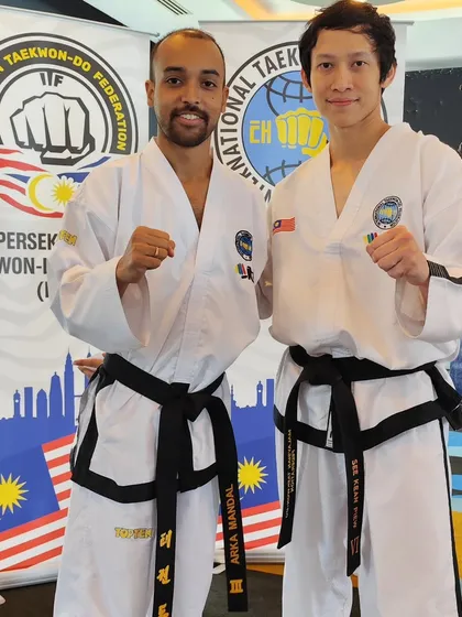 With a fellow black belt from Malaysia. International seminars are a great opportunity to connect with martial artists from all over the world.