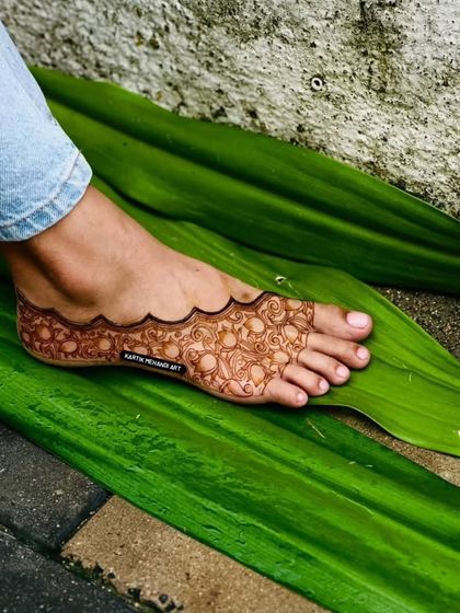A beautiful shot capturing the artistry of our foot mehandi. The design is both traditional and elegant, perfect for any special occasion.