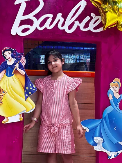 A glamorous Barbie and Disney Princess photo booth. We create picture-perfect spots for kids to pose and feel like royalty.
