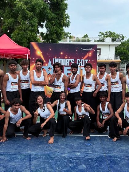 The team looking confident and ready. This is the 'before' shot of a successful audition.