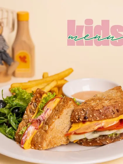 A hearty and delicious sandwich from our kids' menu, served with a fresh salad and fries. It's a complete and balanced meal to keep the energy levels up.