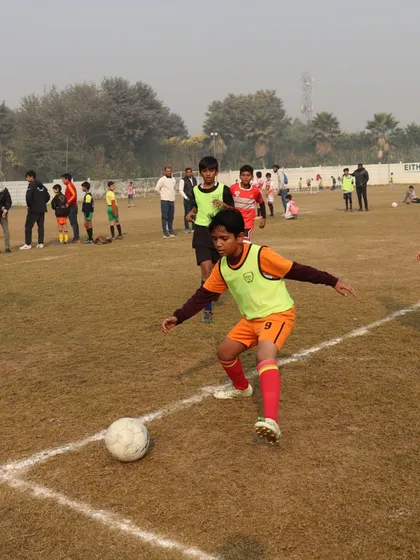 A player demonstrates excellent ball control as he moves down the line during Week 2 of the HCL Future Stars Grassroots League.