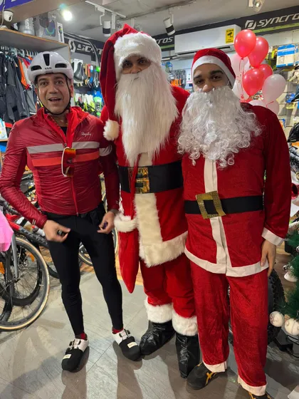 More fun with the Santa costumes inside the bike shop before the ride.