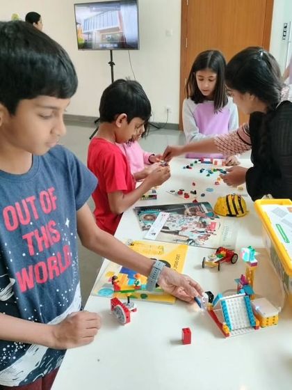Kids and parents exploring our LEGO kits at the Total Environment promotional event. It was a great opportunity to show how we make learning playful.