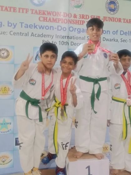 A group of our boys celebrating their victories on the podium.