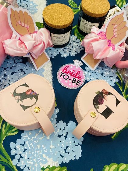 Make your bachelorette unforgettable with our bridesmaids hamper, featuring a personalised jewellery box, a 'Bride-to-be' badge, and other fun goodies.