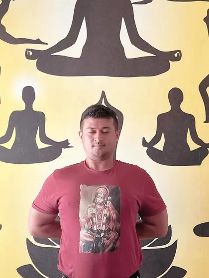 A moment of stillness and gratitude. The reverse prayer pose opens the shoulders and chest, preparing the mind for meditation.