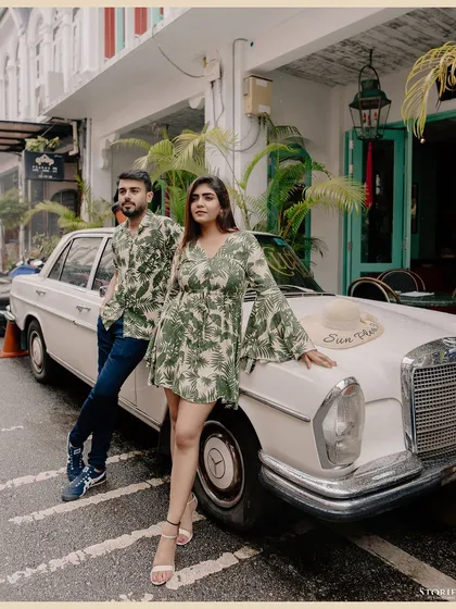 A retro-themed shot with Kunal and Disha posing with a vintage Mercedes in Thailand, adding a touch of old-school cool to their pre-wedding shoot.