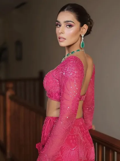 A full-length shot showcasing the unique fishtail silhouette of the skirt, a modern twist on the classic lehenga.