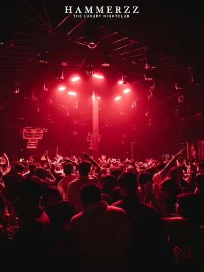 The entire club bathed in red light at Hammerzz. The mood is intense.