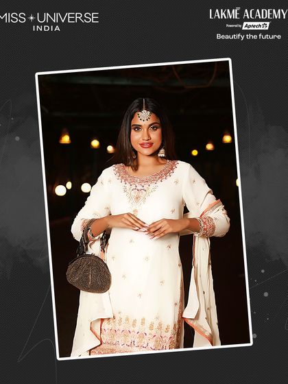 An ethereal white and pink traditional outfit, with makeup perfectly executed by our students for the Miss Universe India 2025 Sufi Night.