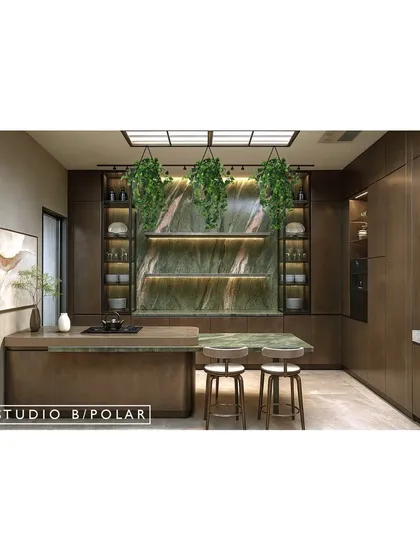 We believe kitchens should be as beautiful as they are functional. In this design, a stunning green stone serves as the backsplash and artistic centerpiece, complemented by the soft glow from a stretch ceiling and the contemporary touch of brushed metal finishes on the cabinetry.