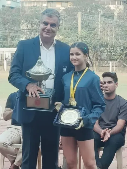 Linn Nikorawala receiving the Best Athlete award at the 40th Annual All Parsees Athletics Meet after winning three gold medals.