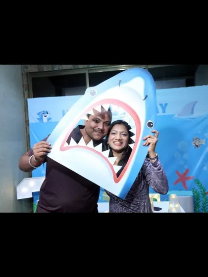 Fun with the Baby Shark theme. Even the parents get in on the action with this shark-head photo prop, making for hilarious and memorable party pictures.