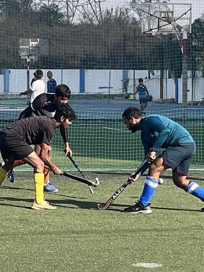 A competitive drill with players fighting for the ball. Our Sunday sessions are always high-energy and full of action.