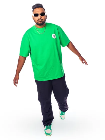 'Unavailable for BS'. A simple, confident pose in a bright green tee, showing my no-nonsense attitude.