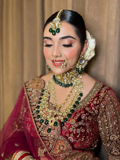 A close-up with eyes closed, showing the delicate shimmer and perfect blending of the eyeshadow.
