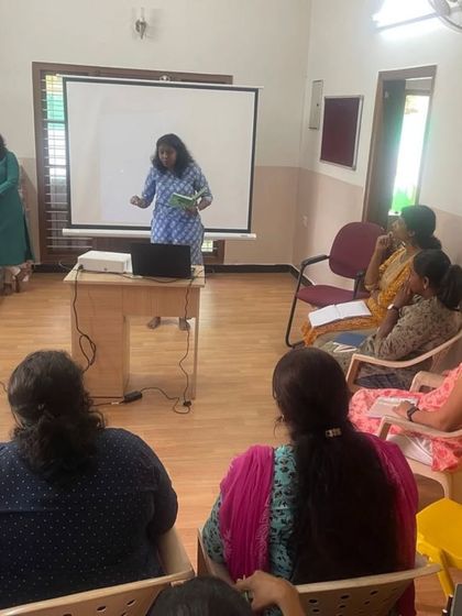 A teacher presents during a workshop, showcasing our collaborative and engaging approach to professional development.