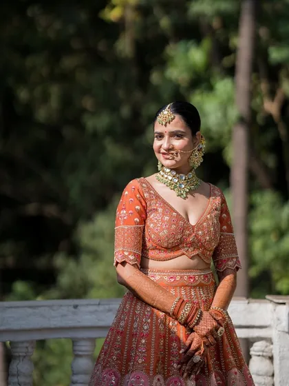 A classic bridal portrait. The clean, elegant hairstyle and soft makeup create a timeless and sophisticated look.