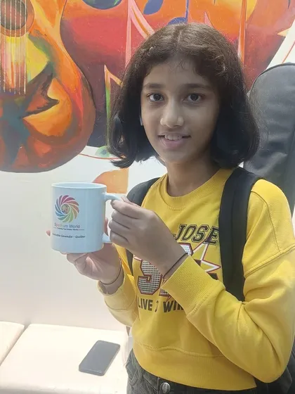 Celebrating a student's success with a small token of appreciation. It's these little moments that strengthen the bond within our Spectrum World family.