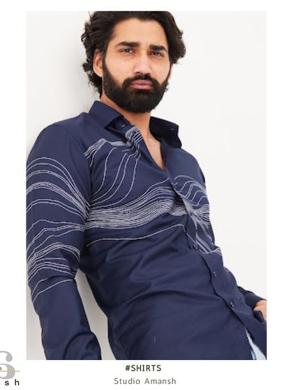 A framed shot that presents the shirt in a more editorial style, emphasizing its artistic and fashionable qualities.