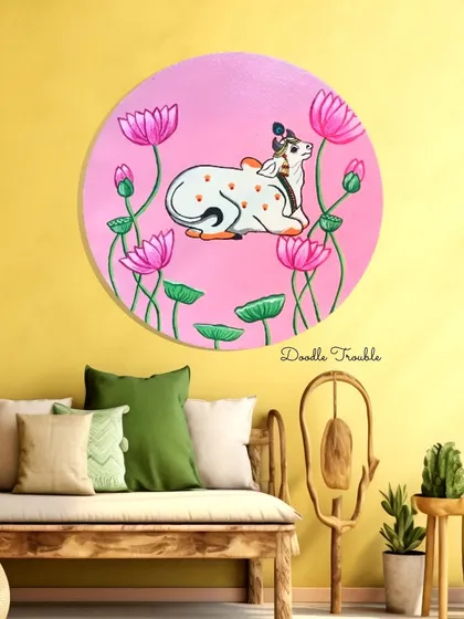 Exploring traditional art forms like Pichwai is a deep passion of mine. This piece, featuring a sacred cow among lotuses, is painted on a round canvas to give a modern twist to a classic, spiritual narrative.