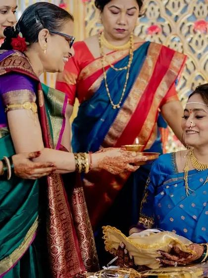 A moment of shared smiles and blessings during the traditional ceremony.