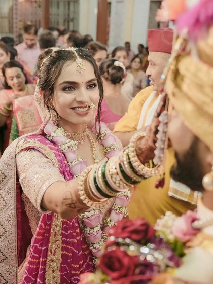 A beautiful candid moment between the bride and groom. Her natural and minimal makeup allows her happiness to be the main focus.