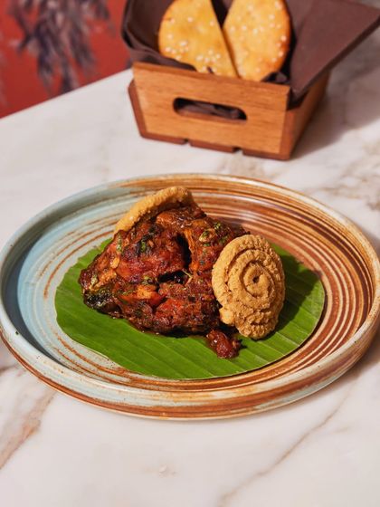 A taste of Comorin, delivered to you. This image showcases one of our dishes packed and ready for delivery, ensuring you can enjoy our signature flavors from the comfort of your home or office.