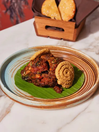 A taste of Comorin, delivered to you. This image showcases one of our dishes packed and ready for delivery, ensuring you can enjoy our signature flavors from the comfort of your home or office.