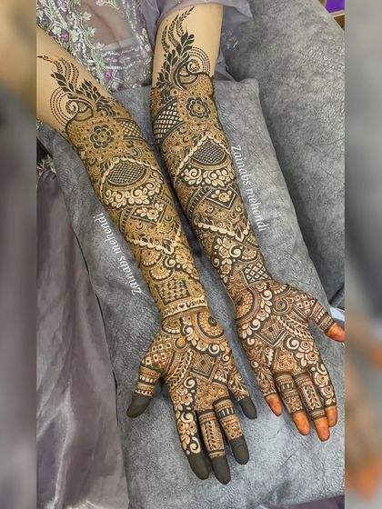 Another view of Saniya's stunning bridal henna, with a mix of traditional and modern elements.