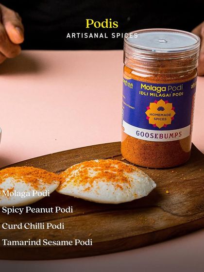 This image showcases my range of artisanal Podis. Featured here is the classic Molaga Podi on idlis, alongside other varieties like Spicy Peanut Podi and Curd Chilli Podi, each offering a unique South Indian flavour experience.