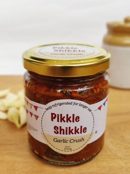 A jar of my popular Garlic Crush. Made with fresh garlic and a secret blend of red chillies and spices, it's a flavour explosion.