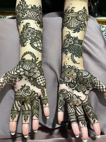 This design features bold floral and paisley elements, and I teach how to make these motifs stand out within a dense bridal pattern.