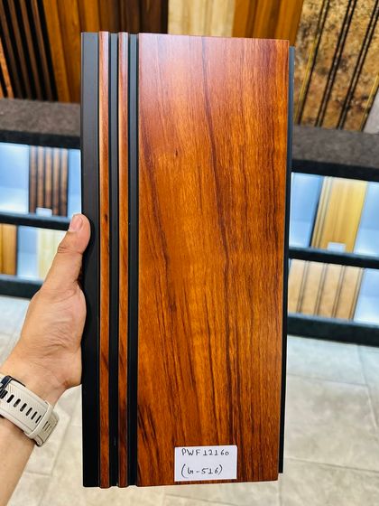 This rich, reddish-brown wood grain fluted panel brings warmth and a classic feel to any room. The deep color is perfect for creating a cozy atmosphere.