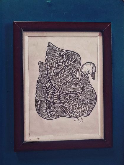 An elegant swan filled with detailed patterns, showcasing how zentangle can be used to create beautiful animal forms.