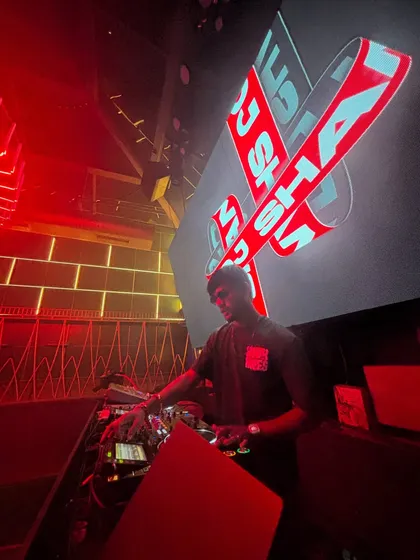 In the zone, under the lights, with my name on the big screen. This shot captures the professional, high-production atmosphere I bring to premier club events.