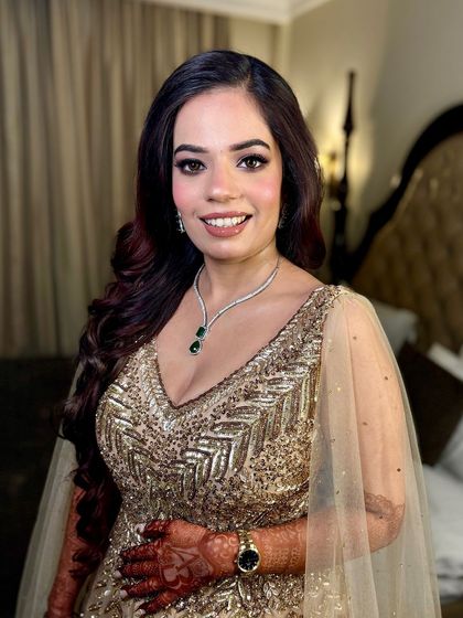 Ashima, looking glamorous for her engagement. This airbrush makeup look features a soft smokey eye and a nude lip.