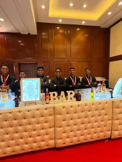 A wide view of our tufted bar setup at the medical conference. The setup is clean, elegant, and can be tailored to any corporate event.