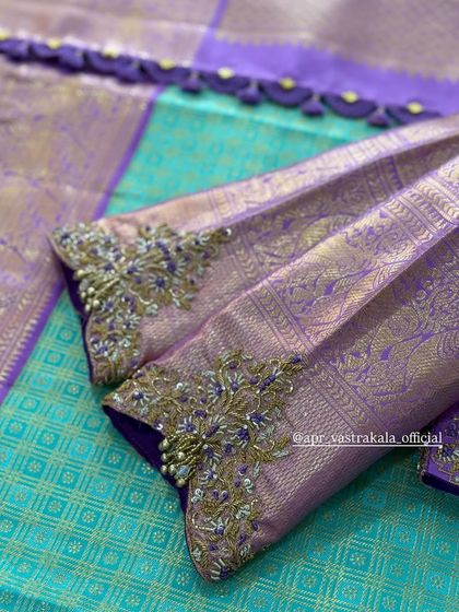 Purple brocade sleeves with delicate zardosi cuffs.