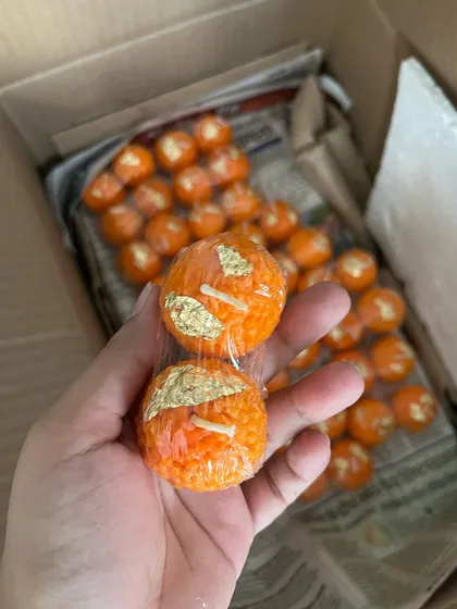 A behind-the-scenes look at preparing laddoo-shaped candles, a unique and fun item I include in many of my Diwali hampers.