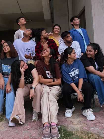 A candid moment with the crew, looking up and dreaming big. We're more than just a dance class; we're a family that supports each other.